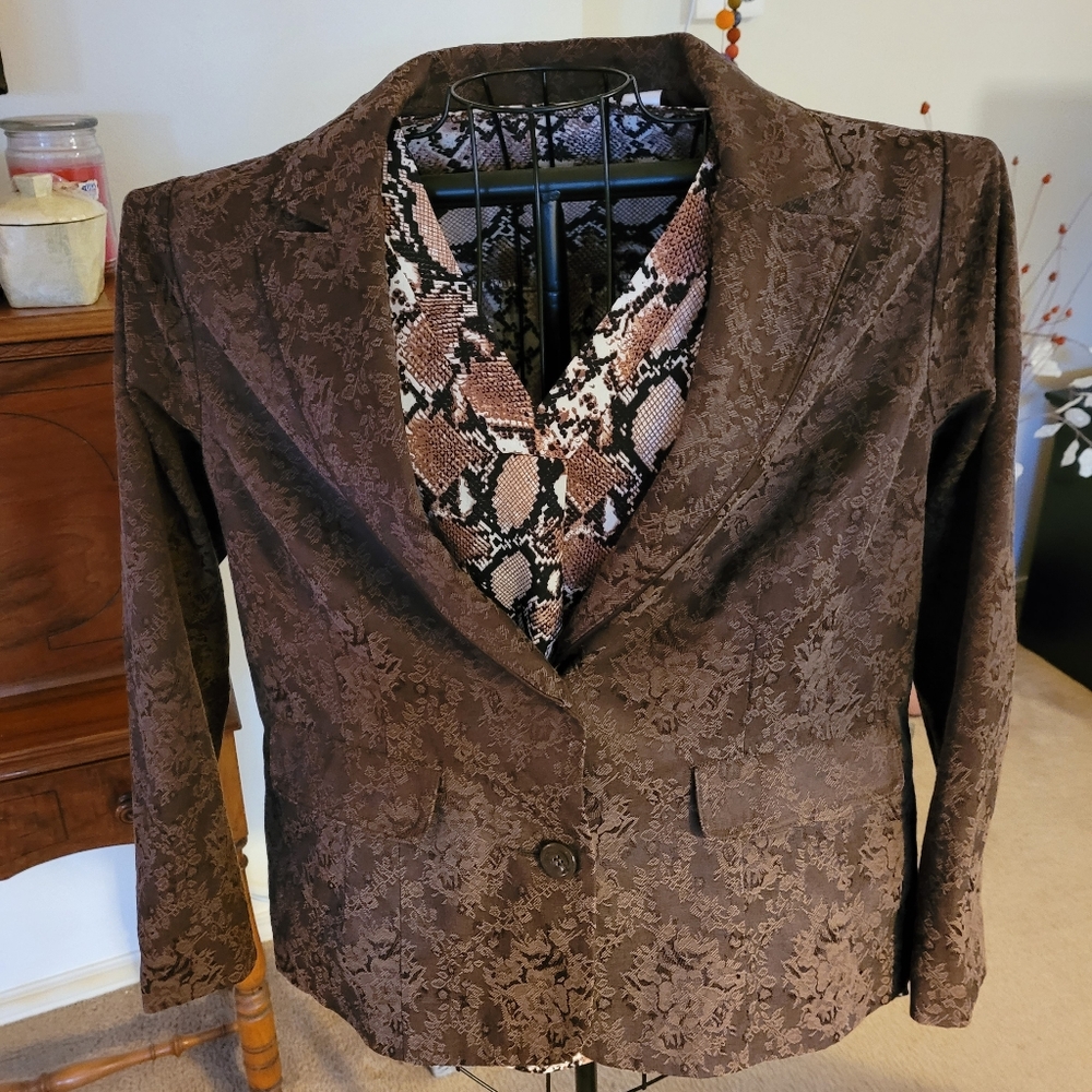 Brown blazer says Size 1